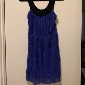 Short purple dress with beading